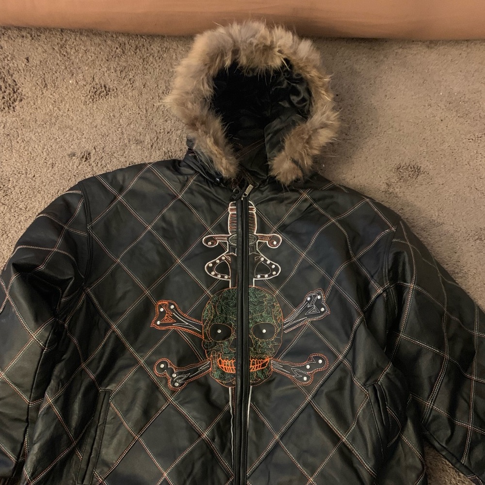 Leather jacket with custom stitching and fur hoody